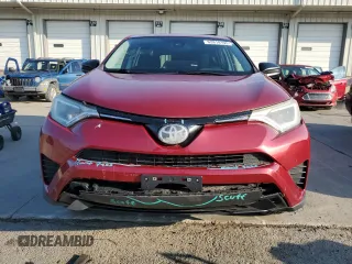 2018 Toyota RAV4 LE with VIN 2T3BFREV7JW723938, listed as a Copart auction lot 62814195 with 107,051 mi miles and Salvage title. Bid and sale history available at DreamBid. Image 5.