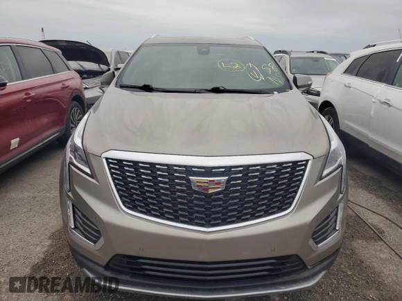 2022 Cadillac XT5 FWD Premium Luxury z VIN 1GYKNCRS1NZ126722, wystawiony jako Copart lot #74231714 z przebiegiem Nie podano mil oraz Nie do naprawy • Non repairable. Historia ofert i sprzedaży dostępna na DreamBid. Obrazek 5.