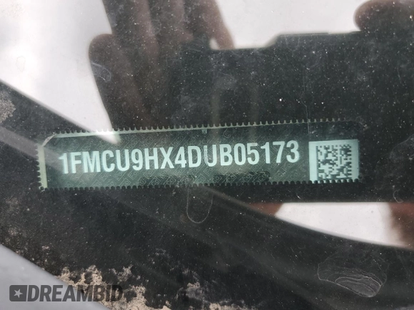 2013 Ford Escape SEL z VIN 1FMCU9HX4DUB05173, wystawiony jako Copart lot #57918125 z przebiegiem 197 195 mil mil oraz Szkoda całkowita • Salvage title. Historia ofert i sprzedaży dostępna na DreamBid. Obrazek 13.