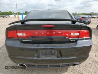 2014 Dodge Charger SXT z VIN 2C3CDXHGXEH295353, wystawiony jako Copart lot #58781935 z przebiegiem 181 199 mil mil oraz Szkoda całkowita • Salvage title. Historia ofert i sprzedaży dostępna na DreamBid. Obrazek 6.