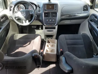 2014 Dodge Grand Caravan SE with VIN 2C4RDGBG2ER341797, listed as a Copart auction lot 49439405 with 102,633 mi miles and Salvage Title. Bid and sale history available at DreamBid. Image 8.