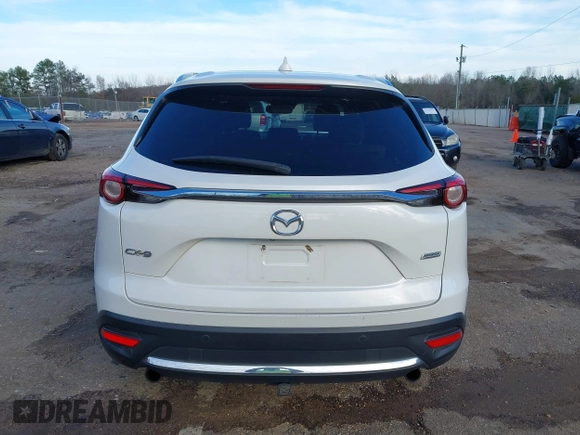 2016 Mazda CX-9 Grand Touring z VIN JM3TCADY4G0124588, wystawiony jako IAAI lot #41192549 z przebiegiem 161 272 mil mil oraz . Historia ofert i sprzedaży dostępna na DreamBid. Obrazek 16.