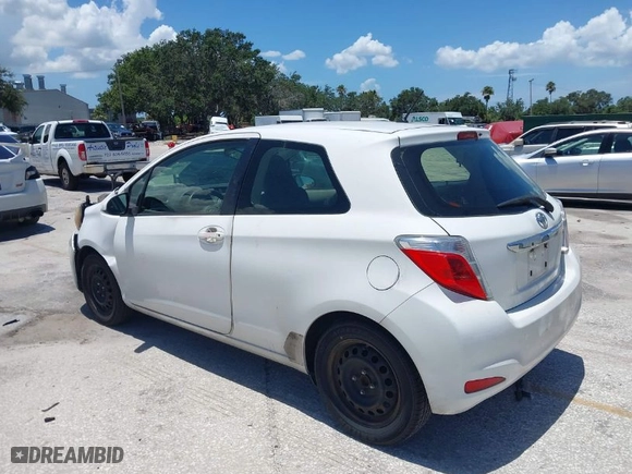2014 Toyota Yaris L with VIN JTDJTUD32ED588779, listed as a IAAI auction lot 39861997 with 227,114 mi miles. Bid and sale history available at carsss.com. Image 3.