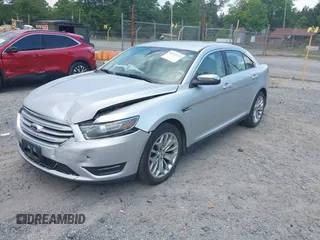 2015 Ford Taurus Limited with VIN 1FAHP2F89FG182598, listed as a IAAI auction lot 42222372 with 124,627 mi miles and . Bid and sale history available at DreamBid. Image 2.