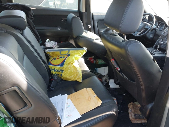 2014 Mazda CX-9 Touring with VIN JM3TB3CV4E0444786, listed as a IAAI auction lot 42249827 with Not provided miles and . Bid and sale history available at DreamBid. Image 8.