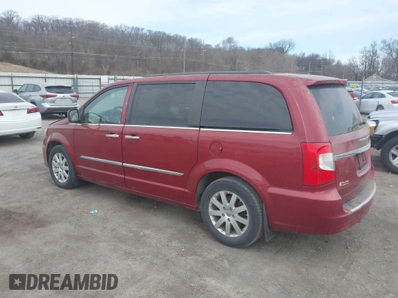 2014 Chrysler Town & Country Touring with VIN 2C4RC1BG9ER418147, listed as a IAAI auction lot 41812594 with 161,356 mi miles and . Bid and sale history available at DreamBid. Image 3.
