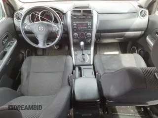 2012 Suzuki Grand Vitara Premium z VIN JS3TD0D20C4101342, wystawiony jako Copart lot #51956595 z przebiegiem 166 710 mil mil oraz Szkody całkowita. Historia ofert i sprzedaży dostępna na DreamBid. Obrazek 8.