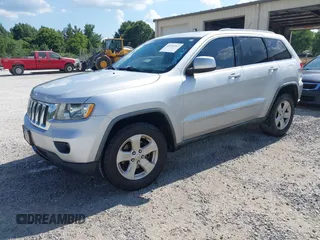 2011 Jeep Grand Cherokee Laredo with VIN 1J4RR4GG2BC714893, listed as a IAAI auction lot 42750763 with 184,475 mi miles and . Bid and sale history available at DreamBid. Image 2.