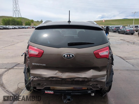 2013 Kia Sportage LX z VIN KNDPBCA29D7458904, wystawiony jako Copart lot #59175745 z przebiegiem 100 719 mil mil oraz Szkoda całkowita • Salvage title. Historia ofert i sprzedaży dostępna na DreamBid. Obrazek 6.