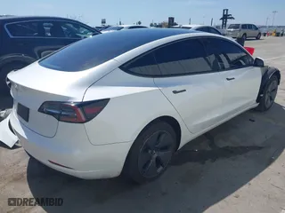 2023 Tesla Model 3 with VIN 5YJ3E1EA6PF405491, listed as a IAAI auction lot 41851797 with 47,581 mi miles. Bid and sale history available at carsss.com. Image 4.