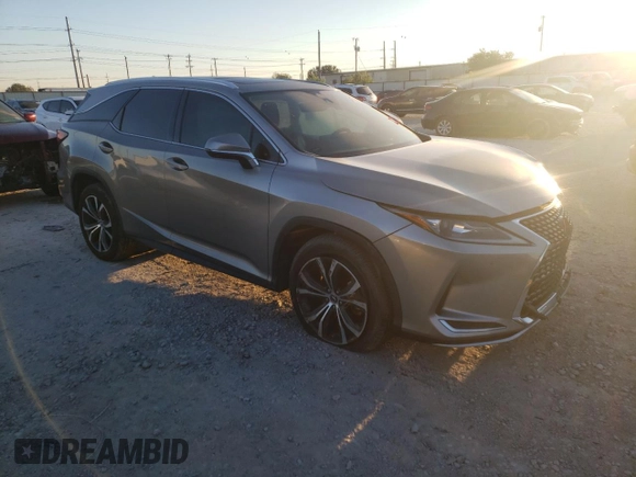 2021 Lexus RX 350L z VIN JTJHZKEA0M2019757, wystawiony jako Copart lot #71006144 z przebiegiem Nie podano mil oraz Szkoda całkowita • Salvage title. Historia ofert i sprzedaży dostępna na DreamBid. Obrazek 4.