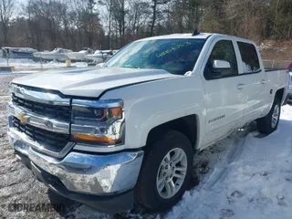 2016 Chevrolet Silverado 1500 LT with VIN 3GCUKREH8GG223505, listed as a IAAI auction lot 41451053 with 134,701 mi miles. Bid and sale history available at carsss.com. Image 2.