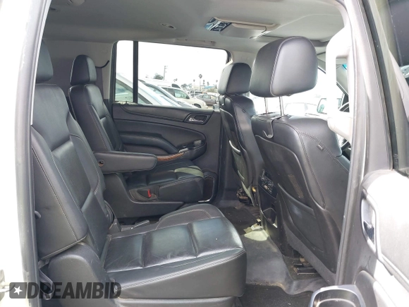 2015 Chevrolet Suburban LTZ with VIN 1GNSKKKC5FR127201, listed as a IAAI auction lot 41706562 with 151,644 mi miles and . Bid and sale history available at DreamBid. Image 8.