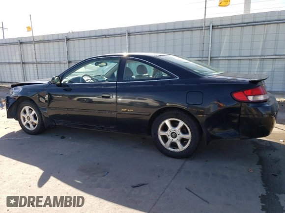 2000 Toyota Solara SE z VIN 2T1CF22P9YC364050, wystawiony jako Copart lot #56972195 z przebiegiem 178 229 mil mil oraz Szkoda całkowita • Salvage title. Historia ofert i sprzedaży dostępna na DreamBid. Obrazek 2.