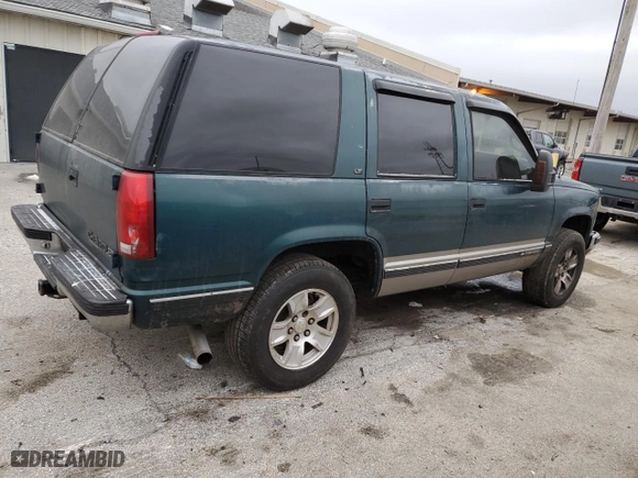 1997 Chevrolet Tahoe with VIN 1GNEK13R5VJ420751, listed as a Copart auction lot 44770025 with 236,378 mi miles and Salvage Title. Bid and sale history available at carsss.com. Image 3.