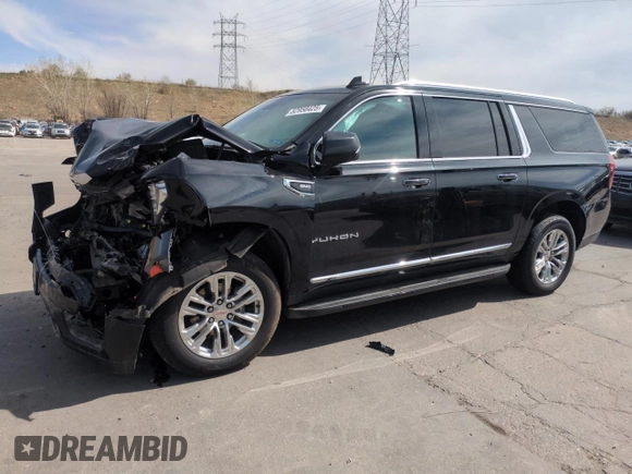2023 GMC Yukon XL SLT z VIN 1GKS2GKD3PR282110, wystawiony jako Copart lot #52950425 z przebiegiem 99 147 mil mil oraz Szkoda całkowita • Salvage title. Historia ofert i sprzedaży dostępna na DreamBid. Obrazek 1.