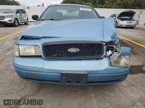 2004 Ford Police Interceptor Base w/3.27 Axle with VIN 2FAFP71W44X176595, listed as a Copart auction lot 72642164 with 136,019 mi miles and Salvage title. Bid and sale history available at DreamBid. Image 5.