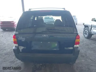 2004 Ford Escape XLT with VIN 1FMYU93194KA77634, listed as a IAAI auction lot 41663464 with 149,600 mi miles. Bid and sale history available at carsss.com. Image 16.