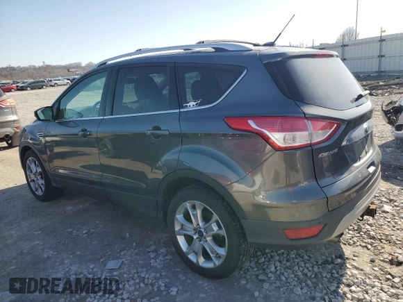 2016 Ford Escape Titanium with VIN 1FMCU9J97GUC18874, listed as a Copart auction lot 48399245 with 138,133 mi miles and Salvage Title. Bid and sale history available at DreamBid. Image 2.