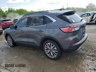 2021 Ford Escape Titanium Hybrid z VIN 1FMCU9DZ4MUA56645, wystawiony jako Copart lot #54059515 z przebiegiem 31 432 mil mil oraz Szkoda całkowita • Salvage title. Historia ofert i sprzedaży dostępna na DreamBid. Obrazek 2.