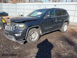 2018 Jeep Grand Cherokee Laredo E with VIN 1C4RJFAG4JC326631, listed as a IAAI auction lot 41191061 with 115,451 mi miles. Bid and sale history available at carsss.com. Image 17.