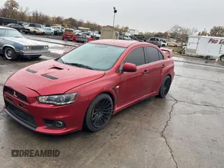 2008 Mitsubishi Lancer Evolution MR z VIN JA3AW56V78U051033, wystawiony jako Copart lot #82855894 z przebiegiem 92 726 mil mil oraz Szkoda całkowita • Salvage title. Historia ofert i sprzedaży dostępna na DreamBid. Obrazek 2.