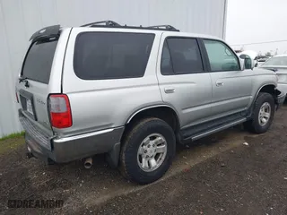 1999 Toyota 4Runner SR5 with VIN JT3HN86RXX0232435, listed as a IAAI auction lot 41473618 with 267,054 mi miles. Bid and sale history available at carsss.com. Image 4.