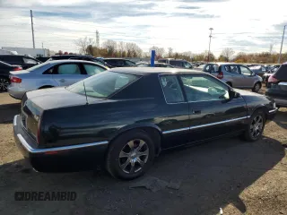 1995 Cadillac Eldorado z VIN 1G6EL12Y1SU623065, wystawiony jako Copart lot #78058414 z przebiegiem 115 060 mil mil oraz Czysty tytuł • Clean title. Historia ofert i sprzedaży dostępna na DreamBid. Obrazek 3.