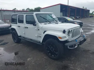 2023 Jeep Wrangler Sahara with VIN 1C4JJXP6XPW641619, listed as a IAAI auction lot 42645792 with 62,586 mi miles and . Bid and sale history available at DreamBid. Image 1.