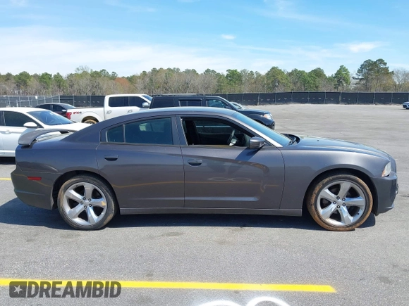 2014 Dodge Charger SE with VIN 2C3CDXBG0EH216023, listed as a IAAI auction lot 41827307 with 243,107 mi miles. Bid and sale history available at carsss.com. Image 13.