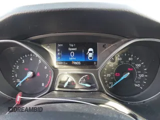2016 Ford Focus SE z VIN 1FADP3FEXGL310270, wystawiony jako IAAI lot #40956503 z przebiegiem 156 812 mil mil oraz . Historia ofert i sprzedaży dostępna na DreamBid. Obrazek 7.
