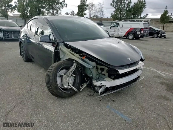 2024 Tesla Model Y with VIN 7SAYGDED0RF111859, listed as a Copart auction lot 44954915 with 6,614 mi miles and Salvage Title. Bid and sale history available at carsss.com. Image 11.