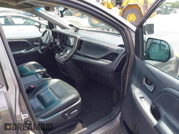 2015 Toyota Sienna SE with VIN 5TDXK3DC2FS552698, listed as a IAAI auction lot 42253119 with 110,710 mi miles and . Bid and sale history available at DreamBid. Image 5.