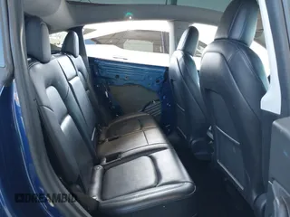 2021 Tesla Model Y Long Range z VIN 5YJYGDEE1MF296454, wystawiony jako IAAI lot #42233096 z przebiegiem 48 125 mil mil oraz . Historia ofert i sprzedaży dostępna na DreamBid. Obrazek 8.