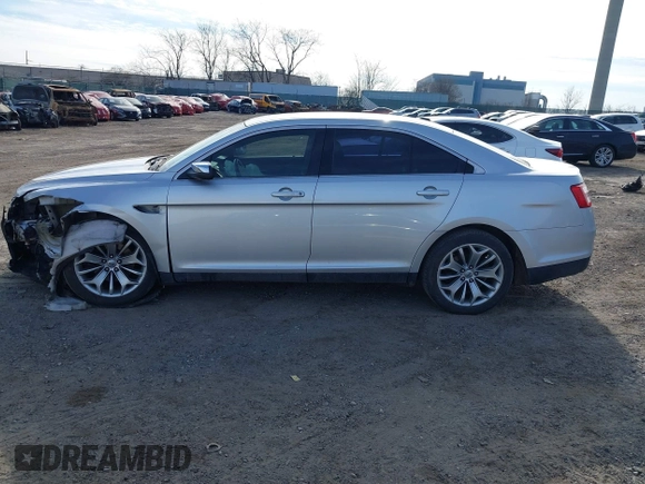 2014 Ford Taurus Limited with VIN 1FAHP2F86EG134779, listed as a IAAI auction lot 41660527 with 115,016 mi miles. Bid and sale history available at carsss.com. Image 14.