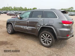 2017 Jeep Grand Cherokee Overland with VIN 1C4RJFCG6HC964435, listed as a IAAI auction lot 42407567 with 113,760 mi miles and . Bid and sale history available at DreamBid. Image 3.