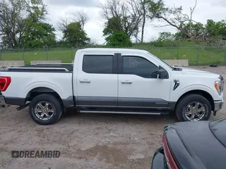2021 Ford F-150 XL z VIN 1FTFW1ED7MFB36946, wystawiony jako IAAI lot #42318029 z przebiegiem 16 960 mil mil oraz . Historia ofert i sprzedaży dostępna na DreamBid. Obrazek 13.