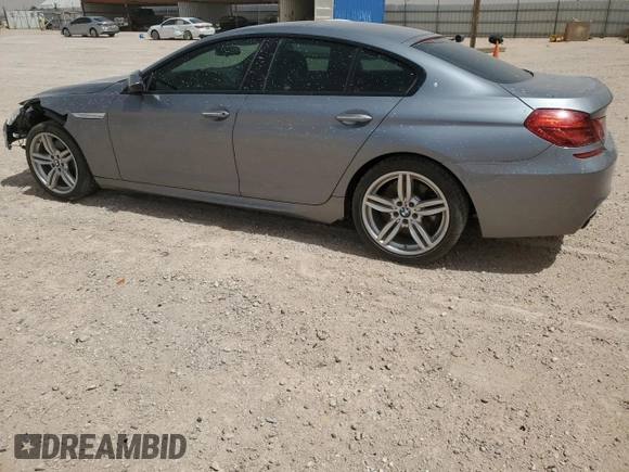 2017 BMW 6 Series 650i with VIN WBA6D4C56HD977805, listed as a Copart auction lot 56655514 with 62,711 mi miles and Salvage Title. Bid and sale history available at carsss.com. Image 2.