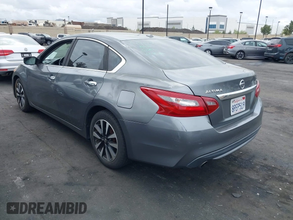 2018 Nissan Altima SV with VIN 1N4AL3AP3JC255885, listed as a IAAI auction lot 42033198 with 134,998 mi miles and . Bid and sale history available at DreamBid. Image 3.
