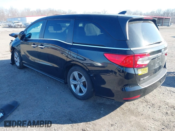2019 Honda Odyssey EX-L with VIN 5FNRL6H77KB097835, listed as a IAAI auction lot 41768458 with 43,682 mi miles. Bid and sale history available at carsss.com. Image 3.