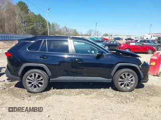 2020 Toyota RAV4 XLE Premium with VIN 2T3C1RFV3LC049230, listed as a IAAI auction lot 41828346 with 62,820 mi miles. Bid and sale history available at carsss.com. Image 14.