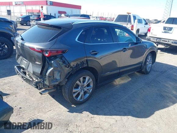 2022 Mazda CX-30 S Select with VIN 3MVDMBBL2NM442323, listed as a IAAI auction lot 41765707 with 40,848 mi miles and . Bid and sale history available at DreamBid. Image 4.