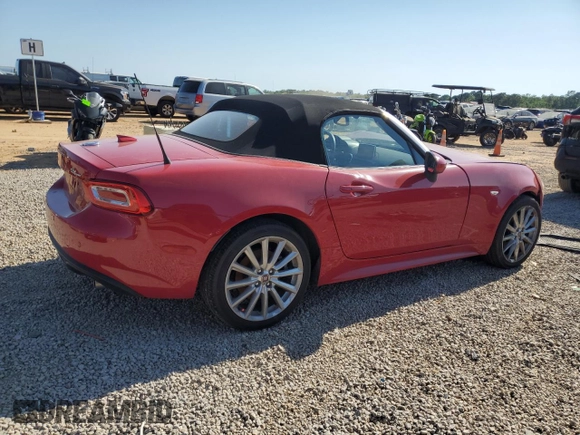 2019 FIAT 124 Spider Lusso z VIN JC1NFAEKXK0143574, wystawiony jako Copart lot #53062155 z przebiegiem 45 633 mil mil oraz Szkoda całkowita • Salvage title. Historia ofert i sprzedaży dostępna na DreamBid. Obrazek 3.