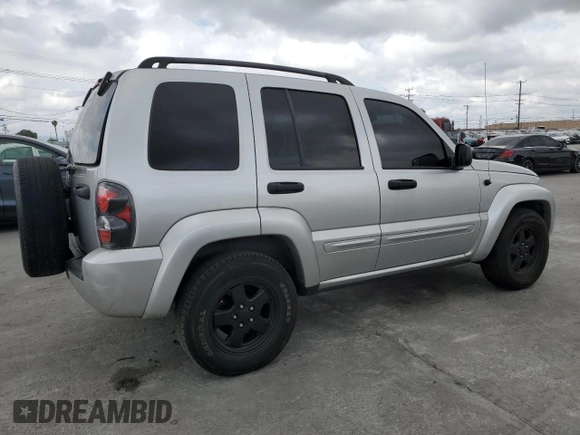 2003 Jeep Liberty Limited with VIN 1J4GK58K33W649265, listed as a Copart auction lot 54264095 with 154,152 mi miles and Salvage title. Bid and sale history available at DreamBid. Image 3.