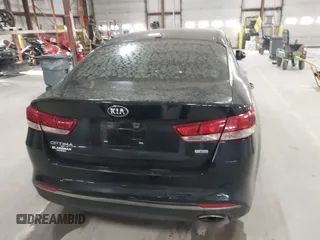 2016 Kia Optima LX Turbo with VIN 5XXGT4L16GG013751, listed as a IAAI auction lot 41843481 with 163,969 mi miles. Bid and sale history available at carsss.com. Image 16.