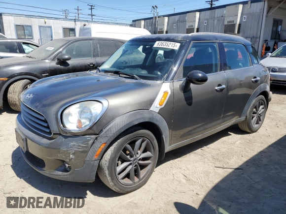2014 MINI Countryman with VIN WMWZB3C54EWR39731, listed as a Copart auction lot 63635215 with 85,751 mi miles and Salvage title. Bid and sale history available at DreamBid. Image 1.