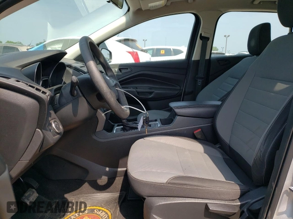 2018 Ford Escape S with VIN 1FMCU0F73JUA70541, listed as a Copart auction lot 60305685 with 92,400 mi miles and Salvage title. Bid and sale history available at DreamBid. Image 7.