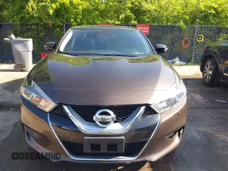 2016 Nissan Maxima Platinum z VIN 1N4AA6AP3GC385276, wystawiony jako IAAI lot #42547410 z przebiegiem 100 307 mil mil oraz . Historia ofert i sprzedaży dostępna na DreamBid. Obrazek 11.