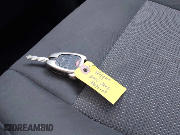 2015 Jeep Patriot Sport with VIN 1C4NJRBB8FD411962, listed as a IAAI auction lot 42504664 with 174,758 mi miles and . Bid and sale history available at DreamBid. Image 11.