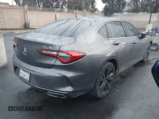 2022 Acura TLX Technology with VIN 19UUB5F46NA003037, listed as a IAAI auction lot 41734924 with 25,096 mi miles and . Bid and sale history available at DreamBid. Image 4.